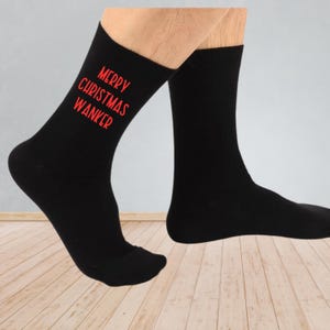 Merry Christmas Wanker Socks – Rude Funny Christmas Socks | Cheeky Holiday Gag Gift | Black Novelty Socks with Bold Print