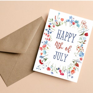 May include: A white card with a floral border in shades of blue and red. The card says "Happy 4th of July" in blue and red text.