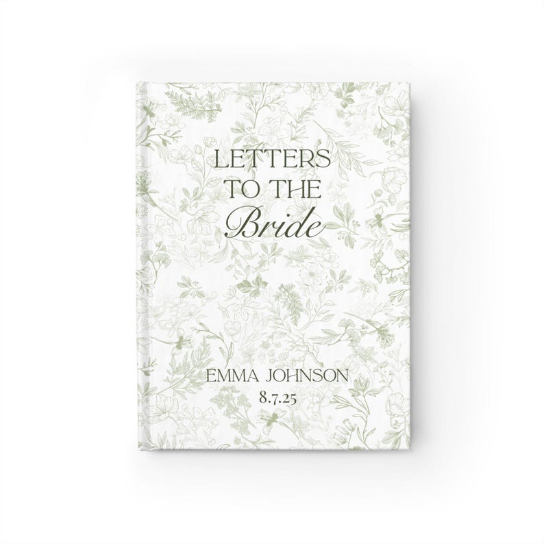 May include: A hardcover journal with a floral design in shades of green and white. The cover reads "LETTERS TO THE Bride" with the name "EMMA JOHNSON" and the date "8.7.25" printed below. The journal is a wedding keepsake.