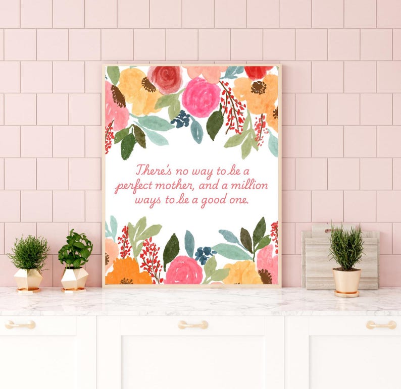 May include: A white background with a floral border and the text "There's no way to be a perfect mother, and a million ways to be a good one."