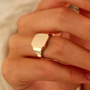 Louis Vuitton 2000s Gold Monogram Square Signet Ring · INTO