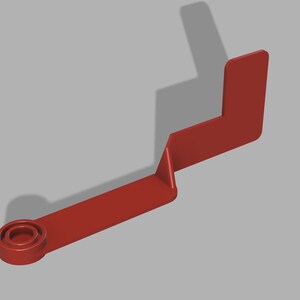 May include: A red plastic hook with a round hole at one end. The hook is bent at a 90-degree angle.