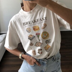 Aesthetic graphic tees india sales