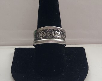 Anillo de dos rosas negras