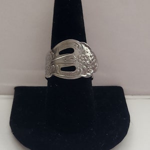 Silver open hole ring