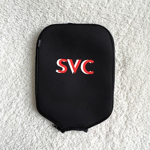 Custom pickleball merchandise for enthusiasts Handmade paddle sleeve with unique design Pickleball lover's gift with custom features Custom paddle accessory for players Paddle protection cover with personalization