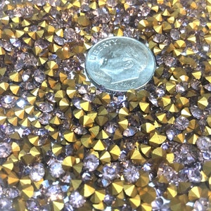 Vintage rhinestones, Swarovski rhinestones, rhinestone lot, SS12 rhinestones, Light Amethyst color. Gold foiled pointed backs, 30 grams