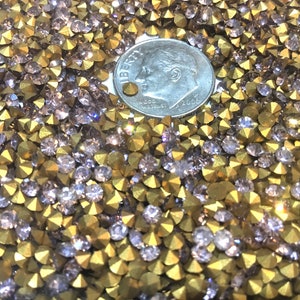 Vintage rhinestones, Swarovski rhinestones, rhinestone lot, SS10 rhinestones, Light Amethyst color. Gold foiled pointed backs, 40 grams