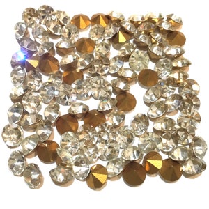Vintage Swarovski SS24 Chaton rhinestones. Crystal color. Gold foiled pointed back. 100 count.