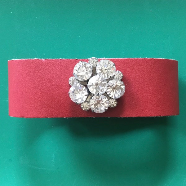 Red leather cuff bracelet adorned with Vintage “snowflake” rhinestone jewelry piece, “up cycled “, repurposed costume jewelry