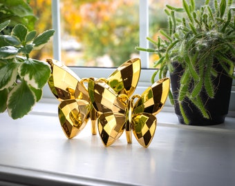 Goldene Schmetterlingsfiguren - 2-teiliges Set - Dekoration - Tischdekoration - Stilvolle Wohnzimmerakzente