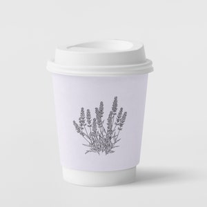May include: White to-go coffee cup with a lavender design. The cup has a white lid.