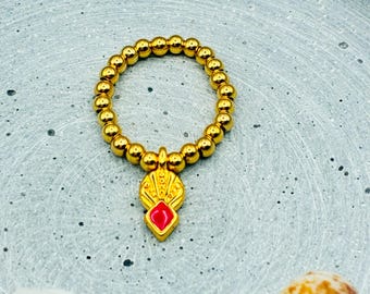 Ring aus Edelstahlperlen goldfarben mit neon Ornament Anhänger - elastisch und gemütlich Anti stress - neon pink rot NEONORNAMENT