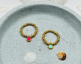 Ring aus Edelstahlperlen goldfarben mit neon Kreis als Anhänger - elastisch und gemütlich - neonpink oder neontürkis NEONCIRCLE