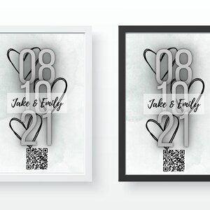Könnte beinhalten: Zwei gerahmte Drucke mit weißem Hintergrund und schwarzen Rahmen. Die Drucke zeigen einen Aquarell-Hintergrund mit einem weißen Herz-Design und den Zahlen 08 10 21. Der Text "Jake & Emily" ist in Schwarz unter den Zahlen geschrieben. Ein QR-Code befindet sich am unteren Rand des Drucks.