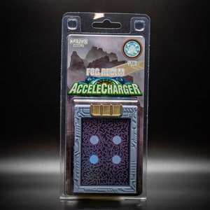 May include: A packaged AccelCharger collectible card. The card features a gray and purple design with four blue circles and the text "FOG REALM ACCELECHARGER." The packaging includes the text "KRAZY 8" and a gemstone graphic.