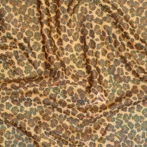 Leopard Hologram in Stretch Poly Spandex tricot Fabric | Spandex Palace