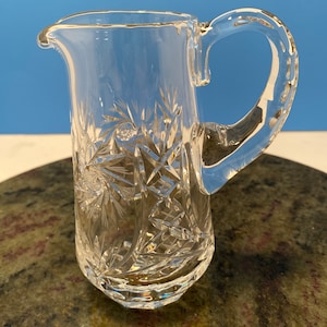 Cut crystal small pitcher.