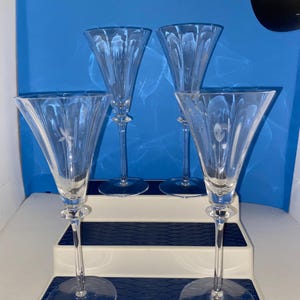 set of 4 vintage Mikasa  9” tall crystal wine glasses. First Love pattern.