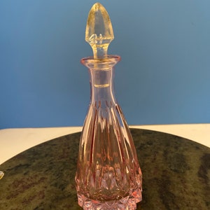 Vintage pink glass perfume bottle.