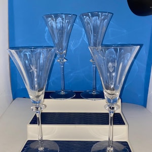 set of 4 vintage Mikasa 9” tall crystal wine glasses. First Love pattern.