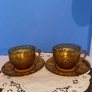 vintage Indiana glass amber sandwich cup and saucer.