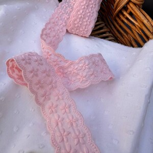 lace trim for bridal wear
eyelet lace for crafts
pink lace for gift wrapping
decorative pink ribbon
pink lace for DIY projects