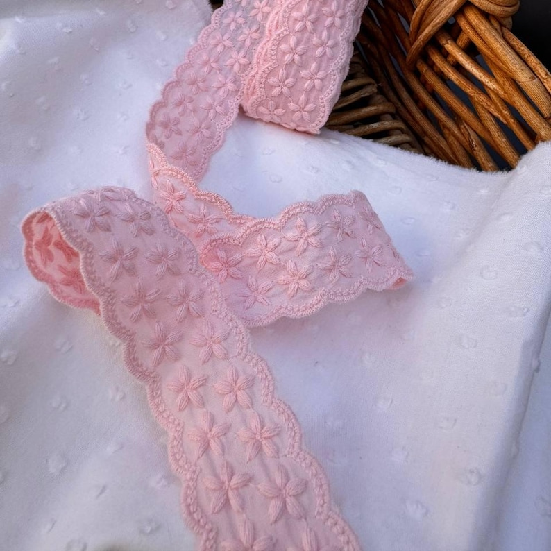 lace trim for bridal wear
eyelet lace for crafts
pink lace for gift wrapping
decorative pink ribbon
pink lace for DIY projects