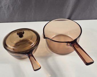 Vintage Visions amber glass  set of saucepans 1L and .05 L..Pre-owned