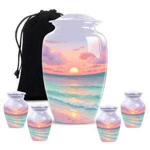 Cremation urn gift set including full size and multiple keepsake urns with a serene seaside design.