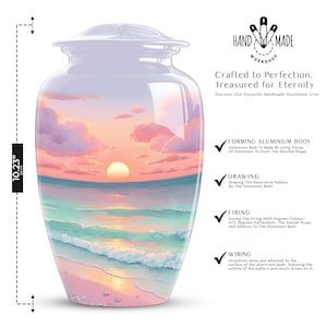 Handmade aluminum beach cremation urn displayed with black velvet bag, featuring coastal sunset and waves.