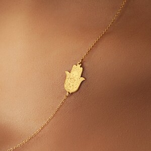 sterling silver mini hamsa pendant hand of god minimalist necklace close up