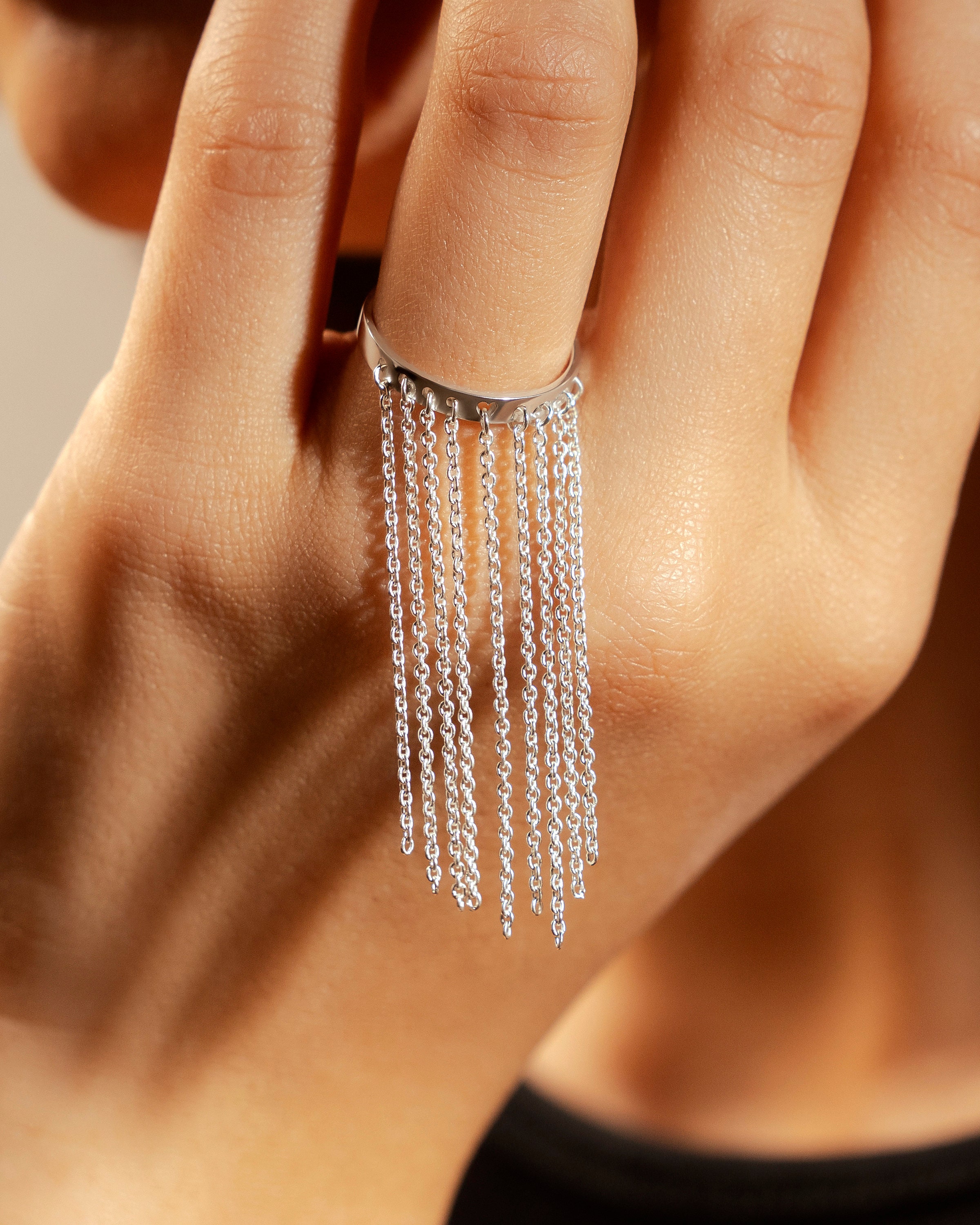 Gold tassel best sale ring