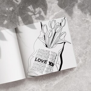 May include: Black and white illustration of a bouquet of tulips in a tote bag. The bag has the words "LOVE YOU" printed on it. The image is on a white page, with a gray background.