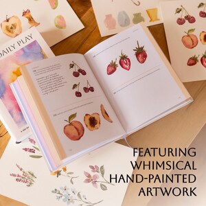 A look inside The Daily Play shower different fruits painted in water color on the pages.