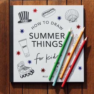 May include: A white instructional drawing book titled HOW TO DRAW SUMMER THINGS for kids, featuring black line art illustrations of a top hat, hot dog, seashell, sunscreen, roller skates, and ice cream, with four colored pencils placed on top.