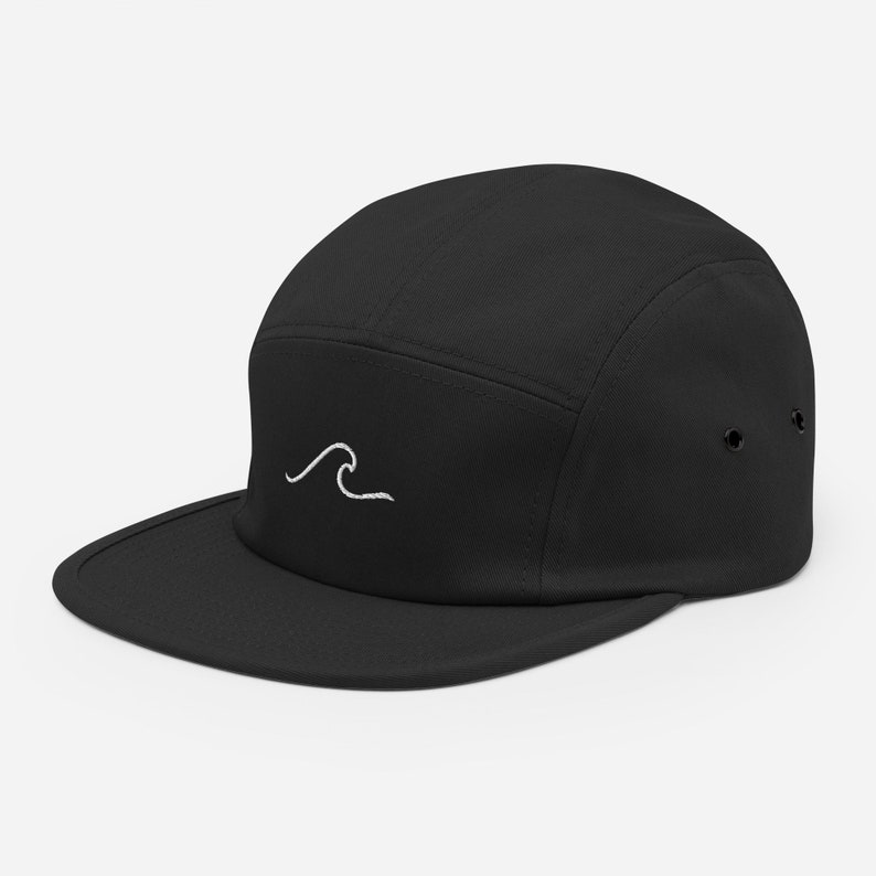 May include: A black 5-panel cap with a white embroidered wave design.