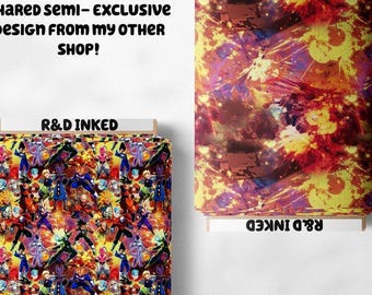 May include: Two fabric rolls with colorful anime-style character designs. One roll features a vibrant pattern of characters in various poses, while the other displays an abstract design in red, yellow, and purple. The text "R&D INKED" is visible.