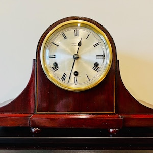 May include: A set of three ceramic mugs with a speckled, matte finish. The mugs are in shades of cream, light gray, and dark gray. Each mug has a simple, minimalist design and a rounded handle. The mugs are stacked on top of each other.