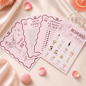 Könnte beinhalten: Ein Set aus drei hellrosa Spielkarten für einen Junggesellinnenabschied mit dunkelroten, gewellten Rändern. Die Karten zeigen Illustrationen einer Braut im Martiniglas, ein Wortsuchrätsel und ein Bingo-Gitter mit hochzeitsbezogenen Symbolen.