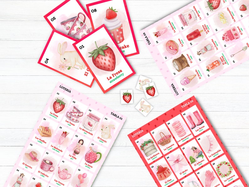 May include: A pink and red bingo game set with a strawberry theme. The set includes a game board with images of strawberries, cakes, and other treats, as well as a set of cards with matching images. The game is called "La Fresa" which means "The Strawberry" in Spanish.