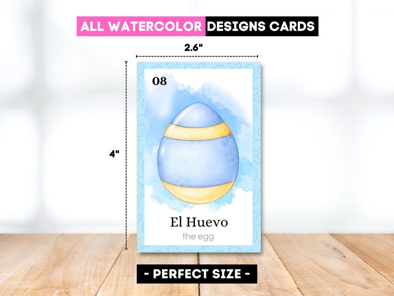May include: A watercolor design card, 4" x 2.6", featuring a blue egg with yellow stripes, labeled "El Huevo" (the egg). The card has a light blue border and the text "ALL WATERCOLOR DESIGNS CARDS".