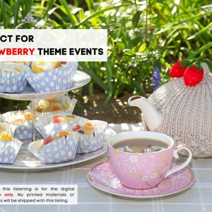 May include: A two-tiered cake stand with white and blue polka dot cupcake liners filled with white frosting and colorful candies. A teapot with a knitted strawberry-themed cozy and a pink teacup and saucer with a floral design are on a white and gray checkered tablecloth. The text "PERFECT FOR STRAWBERRY THEME EVENTS" is at the top of the image.