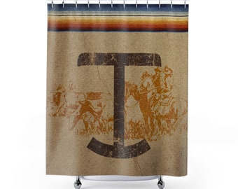 May include: A shower curtain with a brown background and a large, distressed, brown letter "T" in the center. The letter is surrounded by a vintage illustration of cowboys riding horses. The top of the curtain features a colorful striped pattern.