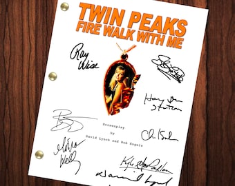 May include: A white script page with the title "Twin Peaks Fire Walk With Me" and the words "Screenplay by David Lynch and Bob Engels". The page is signed by several people, including Ray Wise, Kyle MacLachlan, and Harry Goaz.