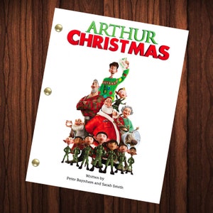 May include: A white script cover for the movie "Arthur Christmas" featuring a group of animated characters, including Santa Claus, elves, and a human character. The title "Arthur Christmas" is written in red and green letters.