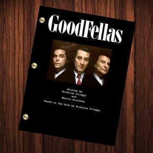 May include: A black and white movie script cover with the title "GoodFellas" in large white letters. The cover features a photo of three men in suits, with the man in the middle wearing a red tie.
