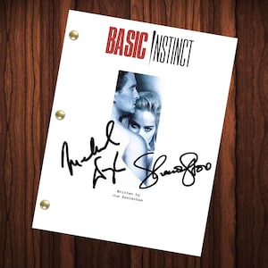 May include: A white script cover for the movie "Basic Instinct" with the title in red. The cover features a photo of Michael Douglas and Sharon Stone. The script is signed by both actors.