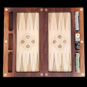 May include: A wooden backgammon set with a dark brown frame and a light wood playing surface. The playing surface features a geometric design and triangular points. Dice and game pieces are included.