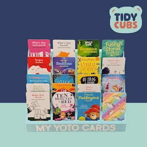 Yoto Card Storage Stand for Audio Cards keeps your little one’s audio story collection tidy with this Yoto card library storage stand, perfectly sized for audio cards like the ones shown in the image.